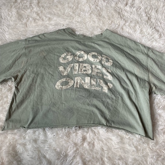light green graphic tee, in the size child medium! - Picture 1 of 3